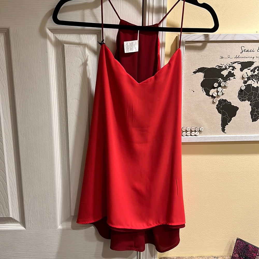Express Size Medium Women’s Blouse (reversible). New with tags!!